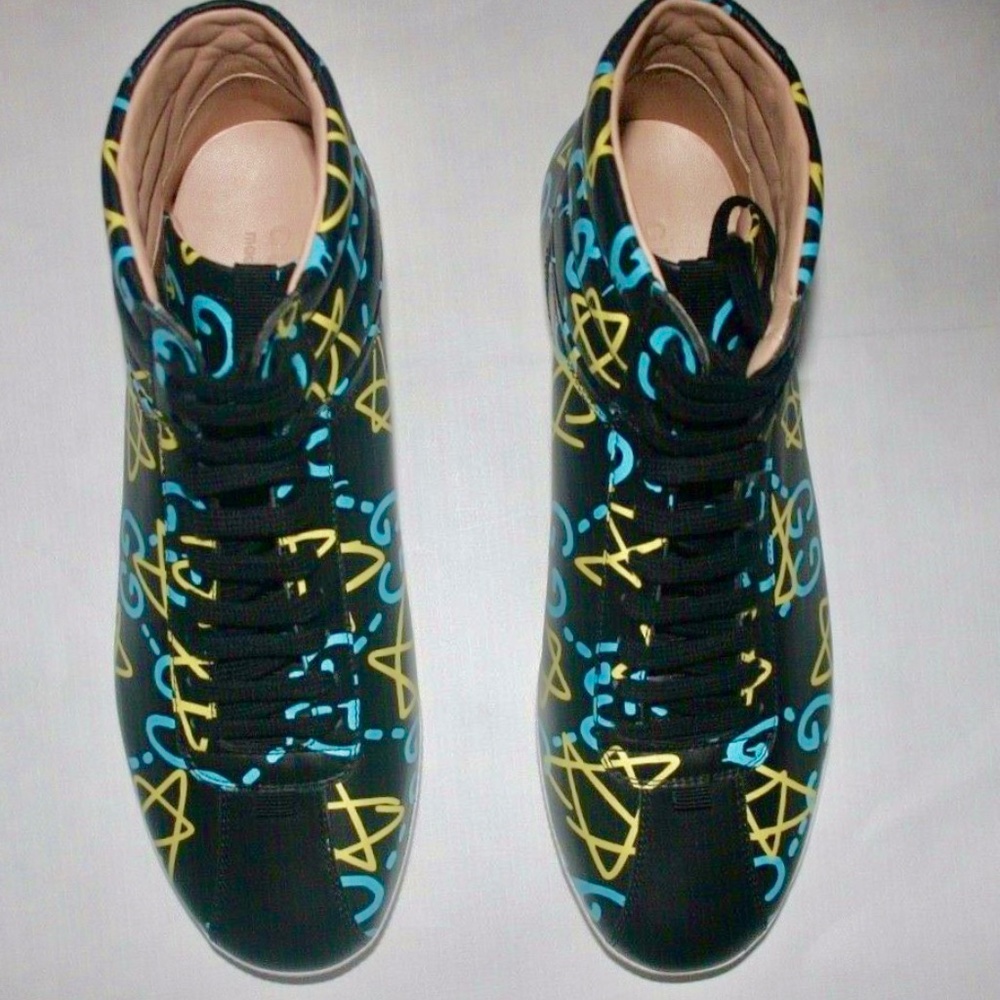 Stylish Black High-Top Sneakers with Blue and Yellow Accents
